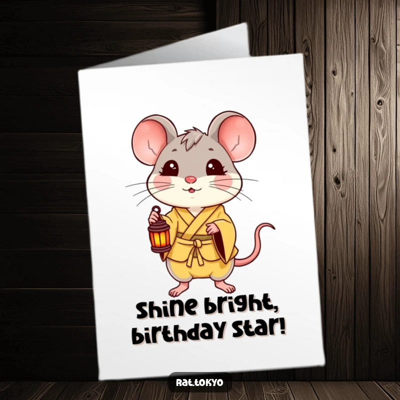 Funny Free Printable Birthday Card: A delighted rat in a yellow kimono holds a small lantern, wishing a happy and bright birthday.